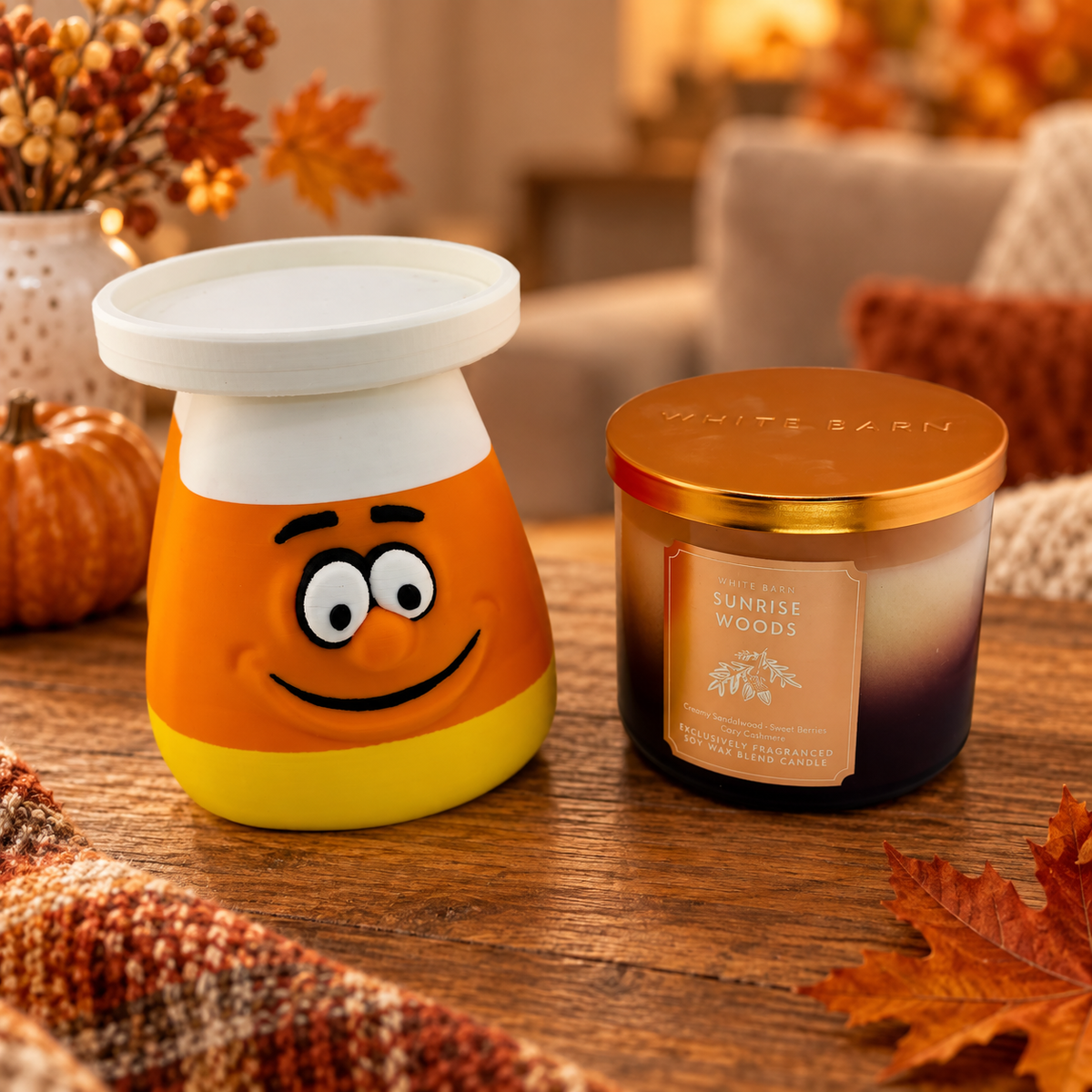 Candy corn 3D printed jar candle holder displayed beside a jar candle