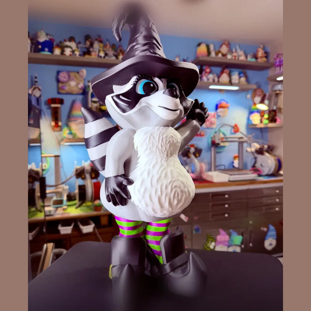 Dress-Up Raccoon shown in a witch outfit