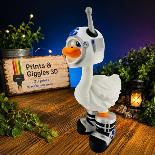 Prints & Giggles 3D astronaut duck figurine wearing a white and silver space helmet with antenna and lunar boots