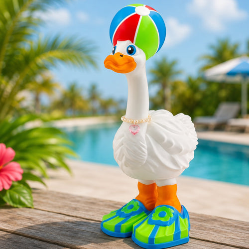 Prints & Giggles 3D goose wearing a colorful beach ball hat and green swim flipper shoes by a sunny pool.
