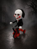 Saw Puppet on Tricycle